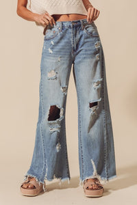 Mid Rise Wide Destructed and Distressed Jeans